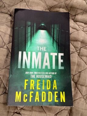 The Inmate by Freida McFadden - Green & Yellow Paperback Thriller